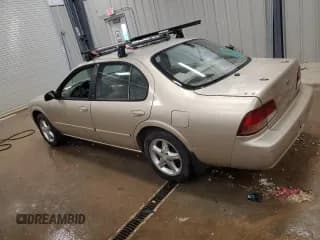 ✅ 1997 Nissan Maxima GXE • VIN: JN1CA21D8VT817054 • Lot: 77760434. Listed on Copart with 282,033 mi. Free auction sales archive from the USA and detailed vehicle history report at DreamBid. Image 2.