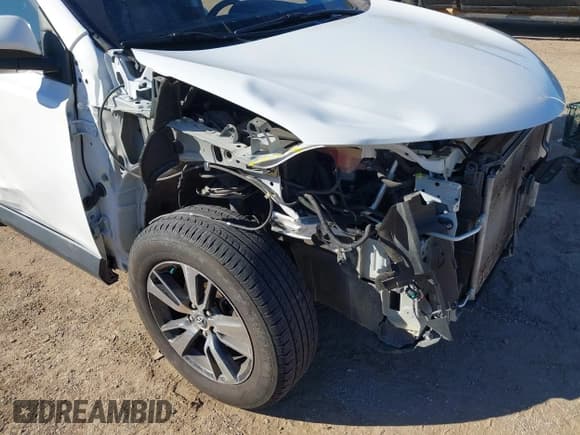 ✅ 2018 Toyota RAV4 XLE • VIN: JTMWFREV1JJ730920 • Lot: 43597877. Listed on IAAI with 88,444 mi. Free auction sales archive from the USA and detailed vehicle history report at DreamBid. Image 6.
