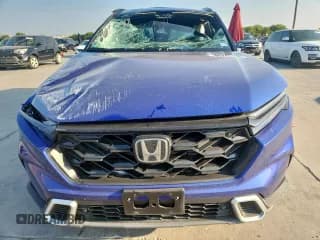 ✅ 2025 Honda CR-V Sport Touring • VIN: 7FARS6H94SE084579 • Лот: 80746895. Опубликован ранее на Copart с пробегом 7 348 миль. Бесплатный доступ к архиву аукционных продаж из США и подробный отчёт об истории автомобиля на DreamBid. Изображение 5.