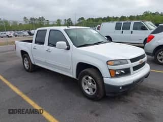 2012 Chevrolet Colorado 1LT z VIN 1GCDSCFE0C8101609, wystawiony jako IAAI lot #41914027 z przebiegiem 143 805 mil mil oraz . Historia ofert i sprzedaży dostępna na DreamBid. Obrazek 1.