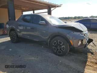 2023 Hyundai Santa Cruz SEL z VIN 5NTJB4AE8PH060543, wystawiony jako Copart lot #67728434 z przebiegiem 19 140 mil mil oraz Szkoda całkowita • Salvage title. Historia ofert i sprzedaży dostępna na DreamBid. Obrazek 4.