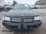 ✅ 2000 Mercedes-Benz SL 500 • VIN: WDBFA68F7YF193189 • Лот: 43392043. Опубликован ранее на IAAI с пробегом 90 807 миль. Бесплатный доступ к архиву аукционных продаж из США и подробный отчёт об истории автомобиля на DreamBid. Изображение 13.