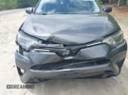 ✅ 2018 Toyota RAV4 LE • VIN: JTMBFREV9JJ742196 • Lot: 42242296. Listed on IAAI with 97,479 mi. Free auction sales archive from the USA and detailed vehicle history report at DreamBid. Image 6.