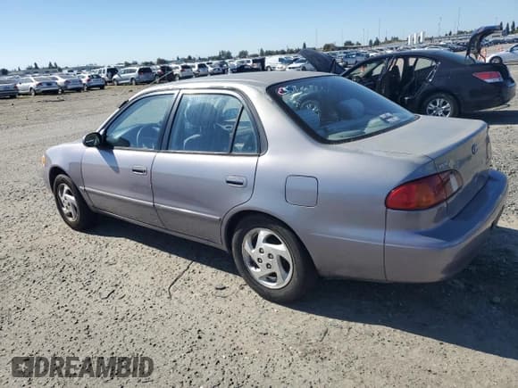 ✅ 1998 Toyota Corolla LE • VIN: 1NXBR18E5WZ099366 • Лот: 87099535. Опубликован ранее на Copart с пробегом 173 725 миль. Бесплатный доступ к архиву аукционных продаж из США и подробный отчёт об истории автомобиля на DreamBid. Изображение 2.