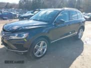 ✅ 2016 Volkswagen Touareg Lux • VIN: WVGEF9BP4GD001508 • Lot: 41850994. Wystawiony na IAAI z przebiegiem 63 355 mil. Bezpłatny archiwum sprzedaży aukcyjnych z USA i szczegółowy raport historii pojazdu na DreamBid. Zdjęcie 2.