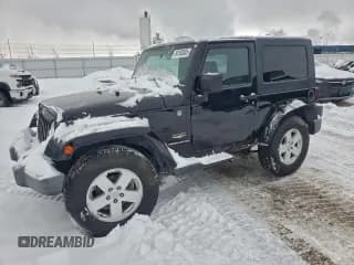 ✅ 2007 Jeep Wrangler Sahara • VIN: 1J8FA54167L197023 • Лот: 94193805. Опубликован ранее на Copart с пробегом 115 282 миль. Бесплатный доступ к архиву аукционных продаж из США и подробный отчёт об истории автомобиля на DreamBid. Изображение 1.