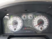 ✅ 2009 Dodge 1500 Laramie • VIN: 1D3HV13T99S800885 • Lot: 42637408. Wystawiony na IAAI z przebiegiem 144 519 mil. Bezpłatny archiwum sprzedaży aukcyjnych z USA i szczegółowy raport historii pojazdu na DreamBid. Zdjęcie 7.