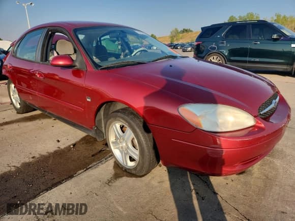 ✅ 2000 Ford Taurus SEL • VIN: 1FAFP56S7YG184583 • Lot: 71127155. Listed on Copart with 158,232 mi. Free auction sales archive from the USA and detailed vehicle history report at DreamBid. Image 4.