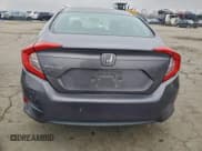 ✅ 2016 Honda Civic LX • VIN: 19XFC2F57GE220687 • Лот: 93369895. Опубликован ранее на Copart с пробегом 107 527 миль. Бесплатный доступ к архиву аукционных продаж из США и подробный отчёт об истории автомобиля на DreamBid. Изображение 6.