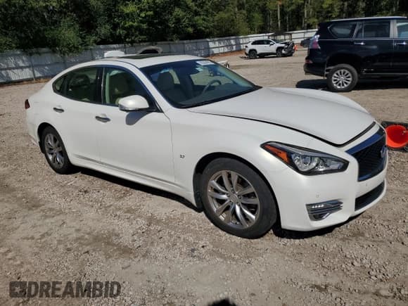 ✅ 2015 Infiniti Q70 • VIN: JN1BY1AP8FM541868 • Lot: 85094085. Listed on Copart with 72,439 mi. Free auction sales archive from the USA and detailed vehicle history report at DreamBid. Image 4.