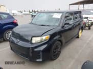 ✅ 2012 Scion xB • VIN: JTLZE4FE4CJ013209 • Lot: 43336960. Listed on IAAI with 129,734 mi. Free auction sales archive from the USA and detailed vehicle history report at DreamBid. Image 2.