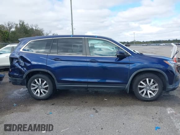 ✅ 2019 Honda Pilot EX-L • VIN: 5FNYF5H51KB044995 • Lot: 43793459. Listed on IAAI with 57,747 mi. Free auction sales archive from the USA and detailed vehicle history report at DreamBid. Image 14.