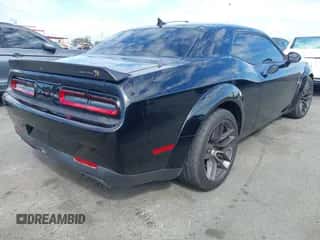 2021 Dodge Challenger R/T Scat Pack Widebody z VIN 2C3CDZFJ7MH677011, wystawiony jako IAAI lot #43412091 z przebiegiem 26 783 mil mil oraz . Historia ofert i sprzedaży dostępna na DreamBid. Obrazek 4.