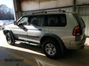 ✅ 2002 Mitsubishi Montero Sport ES • VIN: JA4LS21H32J058330 • Lot: 83523844. Listed on Copart with 186,781 mi. Free auction sales archive from the USA and detailed vehicle history report at DreamBid. Image 2.