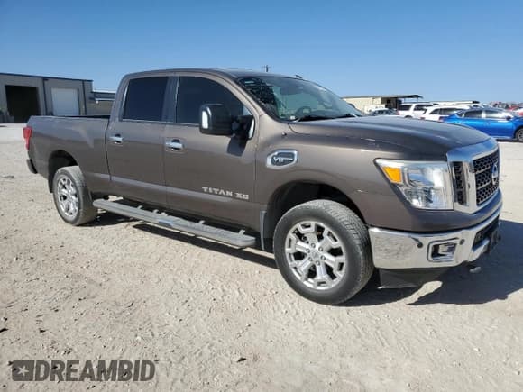 ✅ 2017 Nissan Titan SV • VIN: 1N6AA1F28HN551630 • Лот: 87104504. Опубликован ранее на Copart с пробегом 136 518 миль. Бесплатный доступ к архиву аукционных продаж из США и подробный отчёт об истории автомобиля на DreamBid. Изображение 4.
