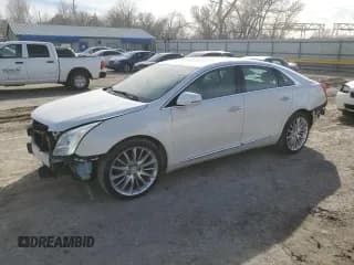 ✅ 2016 Cadillac XTS Platinum • VIN: 2G61T5S34G9124677 • Lot: 46629605. Wystawiony na Copart z przebiegiem 97 212 mil. Bezpłatny archiwum sprzedaży aukcyjnych z USA i szczegółowy raport historii pojazdu na DreamBid. Zdjęcie 1.