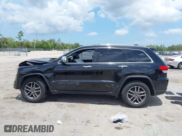 ✅ 2020 Jeep Grand Cherokee Limited • VIN: 1C4RJEBG6LC295152 • Lot: 42670230. Listed on IAAI with 136,633 mi. Free auction sales archive from the USA and detailed vehicle history report at DreamBid. Image 14.
