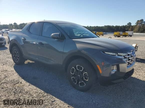 2023 Hyundai Santa Cruz SEL z VIN 5NTJBDAE4PH060653, wystawiony jako Copart lot #82682805 z przebiegiem 33 020 mil mil oraz Szkoda całkowita • Salvage title. Historia ofert i sprzedaży dostępna na DreamBid. Obrazek 4.