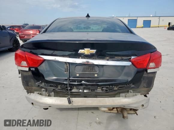 ✅ 2017 Chevrolet Impala LS • VIN: 2G11Z5S33H9136227 • Lot: 70832435. Listed on Copart with 143,622 mi. Free auction sales archive from the USA and detailed vehicle history report at DreamBid. Image 6.