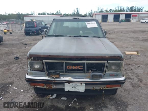 ✅ 1988 GMC Jimmy • VIN: 1GKCT18Z9J8540662 • Lot: 41676054. Wystawiony na IAAI z przebiegiem 211 439 mil. Bezpłatny archiwum sprzedaży aukcyjnych z USA i szczegółowy raport historii pojazdu na DreamBid. Zdjęcie 6.