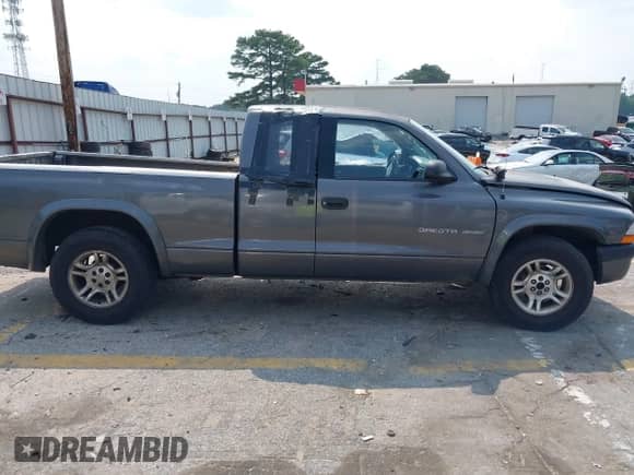 2002 Dodge Dakota Sport z VIN 1B7GL32X92S644072, wystawiony jako IAAI lot #42400800 z przebiegiem 232 611 mil mil oraz . Historia ofert i sprzedaży dostępna na DreamBid. Obrazek 13.