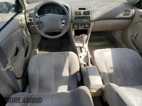 ✅ 1998 Toyota Corolla VE • VIN: 2T1BR12E4WC098669 • Лот: 81456295. Опубликован ранее на Copart с пробегом 49 786 миль. Бесплатный доступ к архиву аукционных продаж из США и подробный отчёт об истории автомобиля на DreamBid. Изображение 8.