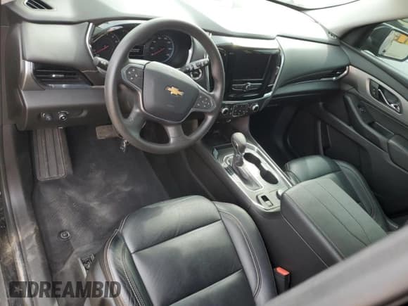 ✅ 2021 Chevrolet Traverse LS • VIN: 1GNEVFKW4MJ199623 • Lot: 58165924. Wystawiony na Copart z przebiegiem 49 999 mil. Bezpłatny archiwum sprzedaży aukcyjnych z USA i szczegółowy raport historii pojazdu na DreamBid. Zdjęcie 8.