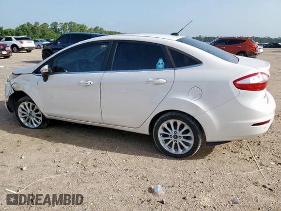 ✅ 2017 Ford Fiesta Titanium • VIN: 3FADP4CJ4HM139250 • Лот: 62940485. Опубликован ранее на Copart с пробегом 142 089 миль. Бесплатный доступ к архиву аукционных продаж из США и подробный отчёт об истории автомобиля на DreamBid. Изображение 2.