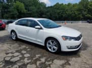 ✅ 2014 Volkswagen Passat SEL Premium • VIN: 1VWCM7A36EC038970 • Lot: 63610385. Wystawiony na Copart z przebiegiem 156 565 mil. Bezpłatny archiwum sprzedaży aukcyjnych z USA i szczegółowy raport historii pojazdu na DreamBid. Zdjęcie 4.