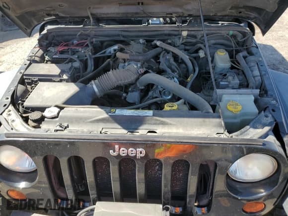 ✅ 2008 Jeep Wrangler Rubicon • VIN: 1J8GA69158L563252 • Lot: 55816534. Listed on Copart with 166,644 mi. Free auction sales archive from the USA and detailed vehicle history report at DreamBid. Image 11.