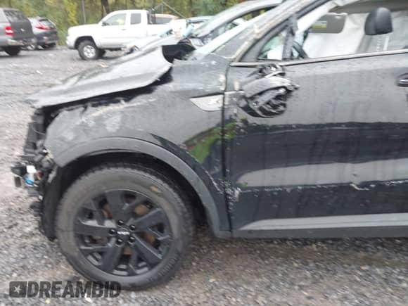 2022 Kia Sorento X-Line S z VIN 5XYRLDLC3NG085283, wystawiony jako IAAI lot #43289881 z przebiegiem 59 393 mil mil oraz . Historia ofert i sprzedaży dostępna na DreamBid. Obrazek 6.