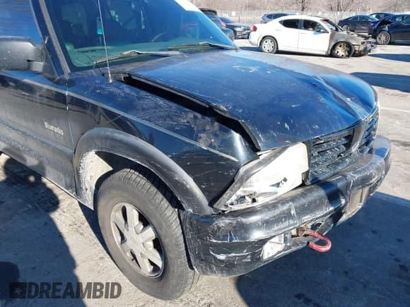 ✅ 2001 Oldsmobile Bravada • VIN: 1GHDT13W312117182 • Lot: 41457726. Wystawiony na IAAI z przebiegiem 160 288 mil. Bezpłatny archiwum sprzedaży aukcyjnych z USA i szczegółowy raport historii pojazdu na DreamBid. Zdjęcie 6.