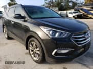✅ 2018 Hyundai Santa Fe Limited • VIN: 5XYZUDLA7JG548967 • Lot: 63579472. Wystawiony na Copart z przebiegiem 161 474 mil. Bezpłatny archiwum sprzedaży aukcyjnych z USA i szczegółowy raport historii pojazdu na DreamBid. Zdjęcie 4.