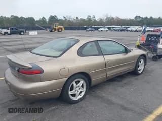 ✅ 1998 Dodge Avenger ES • VIN: 4B3AU52N3WE067556 • Lot: 43770420. Listed on IAAI with 218,750 mi. Free auction sales archive from the USA and detailed vehicle history report at DreamBid. Image 4.