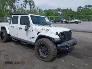 ✅ 2022 Jeep Gladiator Willys Sport • VIN: 1C6HJTAG1NL144540 • Lot: 42098624. Wystawiony na IAAI z przebiegiem 70 376 mil. Bezpłatny archiwum sprzedaży aukcyjnych z USA i szczegółowy raport historii pojazdu na DreamBid. Zdjęcie 1.
