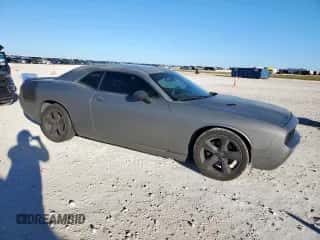 2012 Dodge Challenger SXT z VIN 2C3CDYAG4CH101526, wystawiony jako Copart lot #90643015 z przebiegiem 130 011 mil mil oraz Czysty tytuł • Clean title. Historia ofert i sprzedaży dostępna na DreamBid. Obrazek 4.