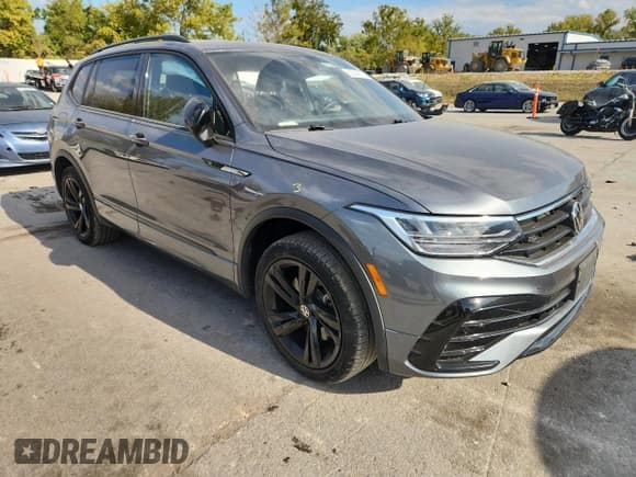 ✅ 2023 Volkswagen Tiguan SE R-Line Black • VIN: 3VVCB7AX1PM057392 • Lot: 82244115. Listed on Copart with 48,658 mi. Free auction sales archive from the USA and detailed vehicle history report at DreamBid. Image 4.