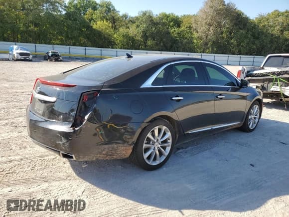 ✅ 2014 Cadillac XTS Luxury • VIN: 2G61N5S33E9271239 • Lot: 86324655. Wystawiony na Copart z przebiegiem 143 493 mil. Bezpłatny archiwum sprzedaży aukcyjnych z USA i szczegółowy raport historii pojazdu na DreamBid. Zdjęcie 3.