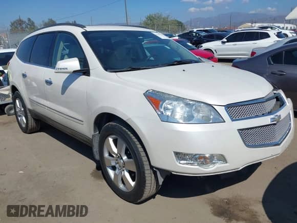 2012 Chevrolet Traverse LTZ z VIN 1GNKRLED2CJ184102, wystawiony jako IAAI lot #43306369 z przebiegiem 156 274 mil mil oraz . Historia ofert i sprzedaży dostępna na DreamBid. Obrazek 1.