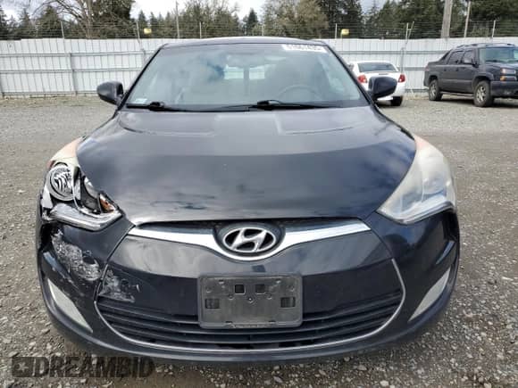 2013 Hyundai Veloster w/Gray Int z VIN KMHTC6AD5DU111338, wystawiony jako Copart lot #51661435 z przebiegiem 55 560 mil mil oraz Szkoda całkowita • Salvage title. Historia ofert i sprzedaży dostępna na DreamBid. Obrazek 5.