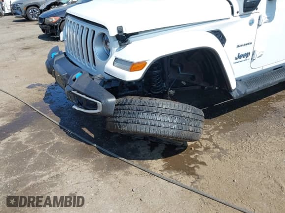 ✅ 2023 Jeep Wrangler Sahara • VIN: 1C4JJXP6XPW537180 • Lot: 42709330. Listed on IAAI with 31,251 mi. Free auction sales archive from the USA and detailed vehicle history report at DreamBid. Image 6.