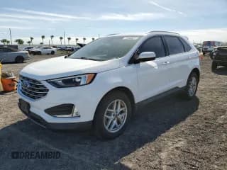 ✅ 2022 Ford Edge SEL • VIN: 2FMPK4J98NBA63801 • Lot: 92074105. Wystawiony na Copart z przebiegiem 65 704 mil. Bezpłatny archiwum sprzedaży aukcyjnych z USA i szczegółowy raport historii pojazdu na DreamBid. Zdjęcie 1.