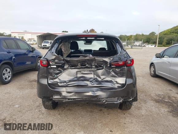 ✅ 2023 Mazda CX-5 S Preferred • VIN: JM3KFBCM3P0230215 • Lot: 43568007. Listed on IAAI with 42,607 mi. Free auction sales archive from the USA and detailed vehicle history report at DreamBid. Image 16.