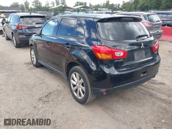 2014 Mitsubishi Outlander ES with VIN 4A4AR3AU7EE002506, listed as a IAAI auction lot 43083381 with 87,329 mi miles and . Bid and sale history available at DreamBid. Image 3.