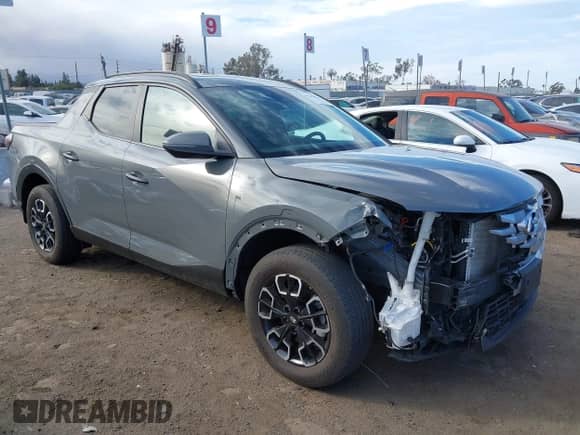 2023 Hyundai Santa Cruz SEL z VIN 5NTJC4AE5PH071917, wystawiony jako IAAI lot #41249984 z przebiegiem 14 703 mil mil oraz . Historia ofert i sprzedaży dostępna na DreamBid. Obrazek 13.