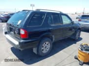 ✅ 2004 Isuzu Rodeo S • VIN: 4S2CK58YX44311680 • Lot: 42476361. Listed on IAAI with 154,693 mi. Free auction sales archive from the USA and detailed vehicle history report at DreamBid. Image 4.