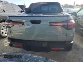 2023 Hyundai Santa Cruz SEL Premium z VIN 5NTJDDAF6PH057322, wystawiony jako Copart lot #77493914 z przebiegiem 21 615 mil mil oraz Nie do naprawy • Non repairable. Historia ofert i sprzedaży dostępna na DreamBid. Obrazek 6.