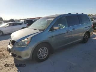 ✅ 2006 Honda Odyssey EX-L • VIN: 5FNRL38786B007077 • Lot: 91233755. Listed on Copart with Not provided. Free auction sales archive from the USA and detailed vehicle history report at DreamBid. Image 1.