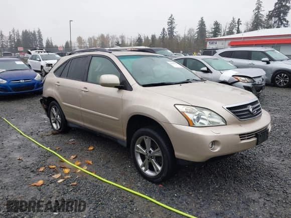 ✅ 2006 Lexus RX 400h • VIN: JTJHW31U760009918 • Lot: 43805214. Listed on IAAI with 258,487 mi. Free auction sales archive from the USA and detailed vehicle history report at DreamBid. Image 1.