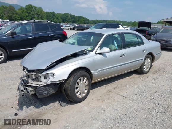 ✅ 1999 Lincoln Continental • VIN: 1LNHM97V5XY630004 • Лот: 42434619. Опубликован ранее на IAAI с пробегом 175 458 миль. Бесплатный доступ к архиву аукционных продаж из США и подробный отчёт об истории автомобиля на DreamBid. Изображение 2.